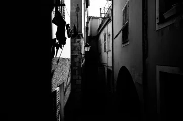 Deurstickers silhouette of a person in the city © nikolas