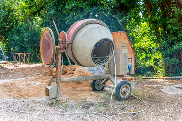 Cement mixer in a private yard - 755583290