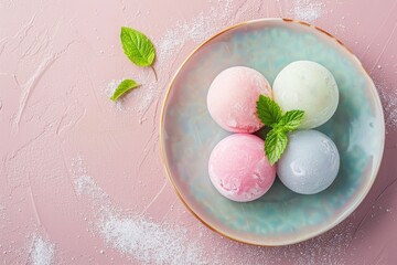 An artistic plate of mochi ice cream in pastel colors