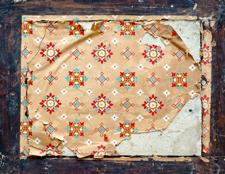 Aged Wallpaper on Wooden Surface