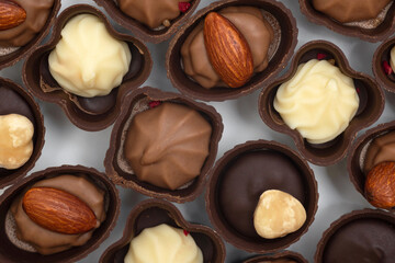 Handmade chocolates close-up. Confectionery products, top view