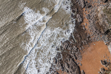 Beautiful landscape from the drone of the French rocky coast by the ocean in Brittany.