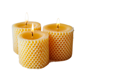 A close up of sets of the yellow natural beeswax candle.
