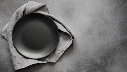 food copy space. top view of empty black plate on concrete background