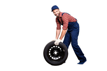 Full size body portrait with copy space of joyful attractive mechanic with stubble in blue overall,...