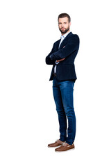 Full size body portrait of elegant trendy teacher with stubble having his arms crossed looking at...