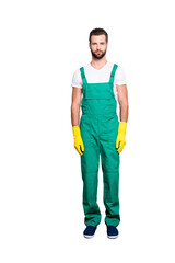 Full size fullbody portrait of handsome attractive bearded concentrated housekeeper with stubble,...