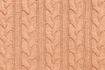 Knitted texture color peach fuzz. Trend Color of the Year 2024 Peach Fuzz