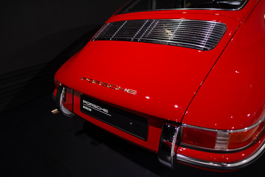 vintage red Porsche 911 901 Number 57 classic car 1963 on display Porsche museum, Oldtimer car retro-style, automotive passion, history automotive industry, Stuttgart, Germany - January 26, 2024