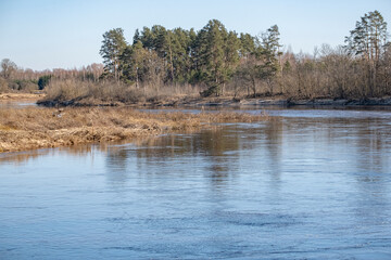 Saka river near Jekabpils town in Latvia. River in spring after floods