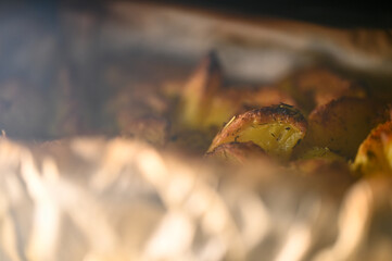 Crispy potato wedges baked with seasonings.