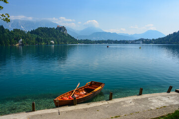 Cloudy summer day by the lake Bled in Slovenia with its clear turquoise water, famous baroque...