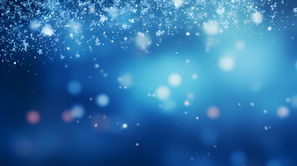 abstract blue background with bokeh lights and falling snowflakes