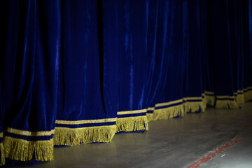 Blue Curtain. Curtain on stage. Blue fabric.