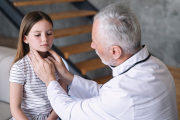 Doctor conduct medical examination throat and diagnosis health of girl patient