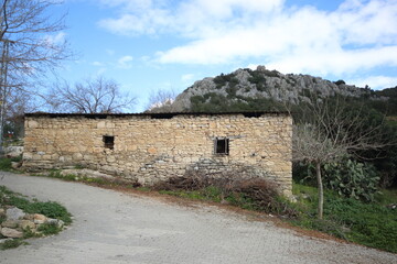 Fototapeta na wymiar abandoned stone house in countryside
