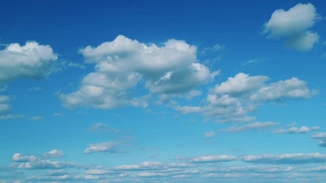 Nature Dark Blue Sky With Clouds Background. Bright Clear Skyline With Beautiful Cloudscape.