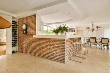 Modern kitchen with brick island and open floor plan