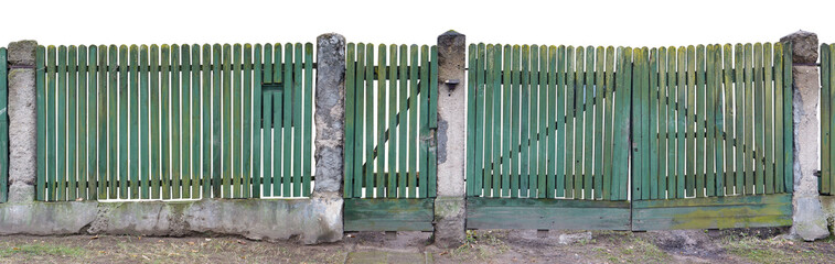 Long destroyed green wooden fence isolated