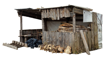 Ugly ruined woodshed in a poor village isolated