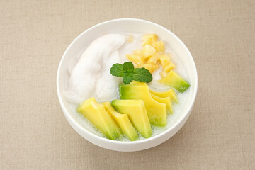 Es teler or es teller, Indonesian dessert, consist of avocado, young coconut, jackfruit, served with coconut milk or sweetened condensed milk. 
