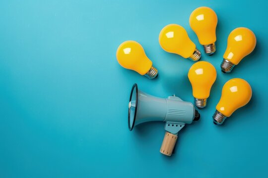 Light bulb and megaphone, idea, communication and advertisement concept.