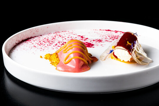 Italian Sicilian cannolo dessert closeup on white plate macro with crust and ricotta cheese