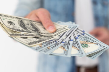 American dollars in a women hands.