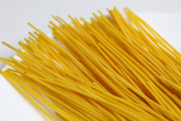 Mie lidi, traditional snack from Indonesia. Noodle-like texture, fried and salted, on white background