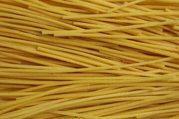 Background texture of Mie Lidi, traditional snack from Indonesia. Noodle-like texture, fried and salted