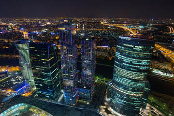 Fototapeta na wymiar Moscow International Business Center at dark night. Investments in Moscow International Business Center was approximately 12 billion dollars