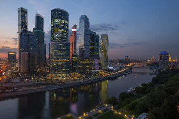  Moscow International Business Center and quay at evening. Investments in Moscow International Business Center was approximately 12 billion dollars