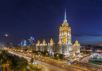 Ukraine hotel with illumination at night in Moscow, Russia, long exposure