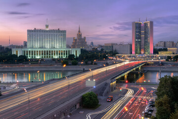 Fototapeta na wymiar Government of Russian Federation, Novoarbatsky bridge in Moscow, Russia at evening