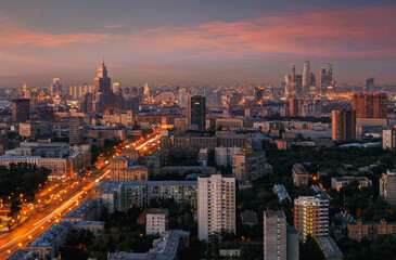 Fototapeta na wymiar Panorama with skyscrapers, Leningradskoe highway during summer sunset in Moscow, Russia