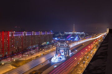 Arch of Triumph with illumination and Poklonnaya Hill Memorial at night in Moscow, Russia