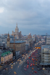 Traffic on Smolenskaya Square in evening Moscow, Russia, long exposure