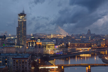 Novospassky bridge, Moscow river, House of music and evening panorama of Moscow, Russia
