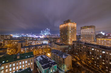Fototapeta na wymiar Evening view of residential district with illumiantion in Moscow, Russia