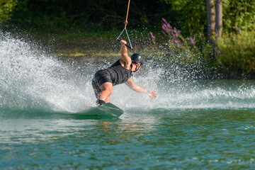 view of a person wakeboarding on a river