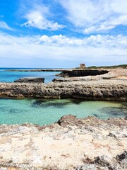 Coastal Sentinel: Torre Pozzelle Overlooking the Azure Waters of Apulia, Italy