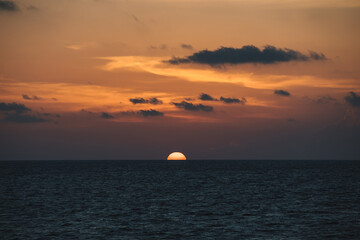 Dark Purple and Orange Sunset over the Sea. 