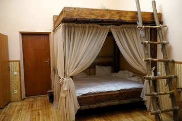 Bunk bed with canopy in rustic style