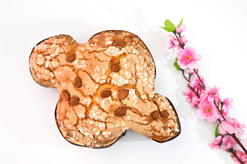 Colomba pasquale or Easter dove is a traditional Italian dessert prepared with sourdough, almonds...