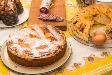 Easter Breakfast whit Colomba Pasquale or Easter Dove,  eggs, pastiera napoletana, corallina salami...