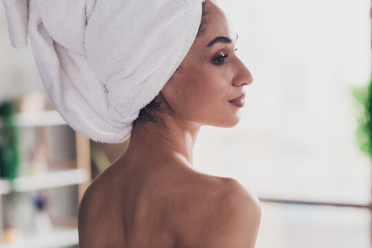 Rear profile photo of gorgeous lovely girl bare shoulders white towel head look away inspiration daylight house indoors