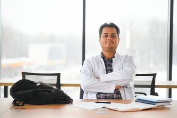 Portrait of a young doctor student studying
