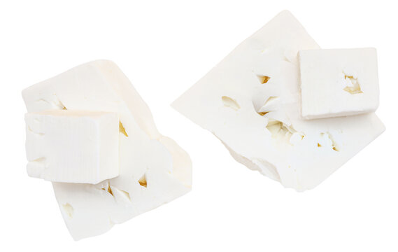Feta cheese on isolated on white background, top view. Various Fesh Greek feta cheese pieces close up. Collection