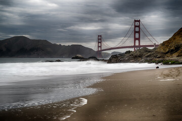 Golden Gate Bridge view from Baker Beach. Pacific coast landscape. San Francisco, California, USA