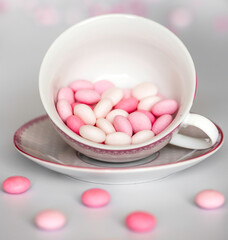pink and white drops in a cup